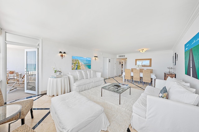 2295 S Ocean Blvd Unit 921, Palm Beach, FL 33480 - living area featuring inlaid floor details, ornamental molding, and light tile patterned floors