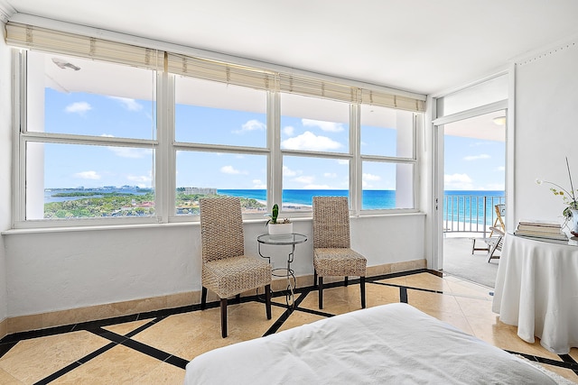 2295 S Ocean Blvd Unit 921, Palm Beach, FL 33480 - bedroom with inlaid floor details, multiple windows, and a water view