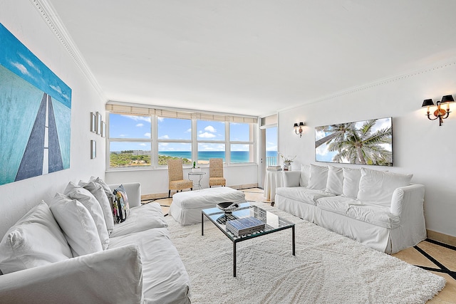 2295 S Ocean Blvd Unit 921, Palm Beach, FL 33480 - living room featuring a water view, crown molding, healthy amount of natural light, and baseboards