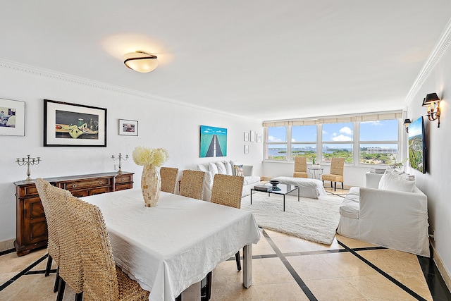 2295 S Ocean Blvd Unit 921, Palm Beach, FL 33480 - dining area featuring inlaid floor details, ornamental molding, and baseboards