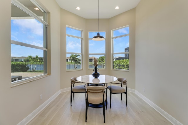 9252 SW Miracoli Way, Port Saint Lucie, FL 34987 - dining space with plenty of natural light, light wood-style flooring, and baseboards
