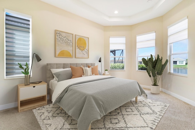 9252 SW Miracoli Way, Port Saint Lucie, FL 34987 - carpeted bedroom with a raised ceiling, baseboards, and recessed lighting