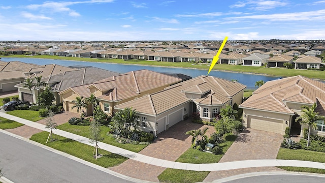 9252 SW Miracoli Way, Port Saint Lucie, FL 34987 - aerial view featuring a water view and a residential view