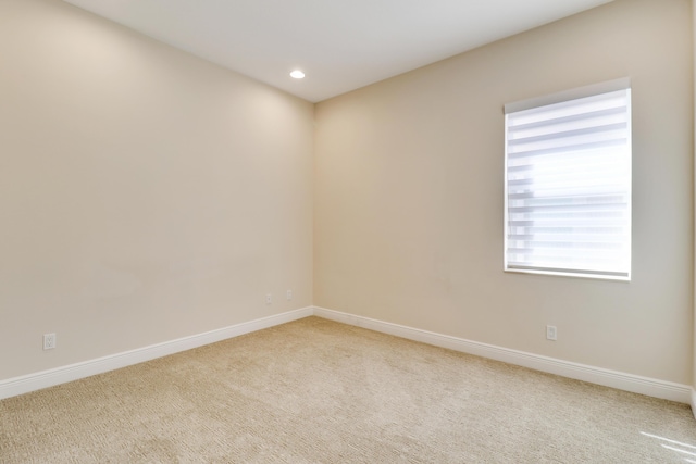9252 SW Miracoli Way, Port Saint Lucie, FL 34987 - empty room with recessed lighting, baseboards, and carpet floors