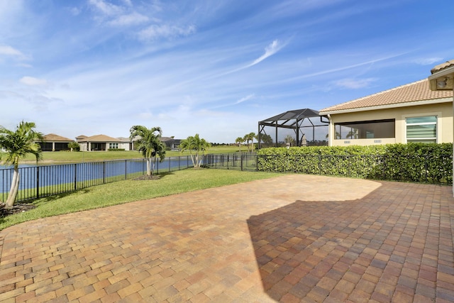 9252 SW Miracoli Way, Port Saint Lucie, FL 34987 - view of patio with a fenced backyard and a water view