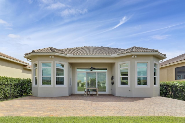 9252 SW Miracoli Way, Port Saint Lucie, FL 34987 - rear view of house featuring a patio, stucco siding, and ceiling fan