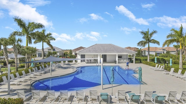 9252 SW Miracoli Way, Port Saint Lucie, FL 34987 - pool featuring a patio area, a residential view, and fence