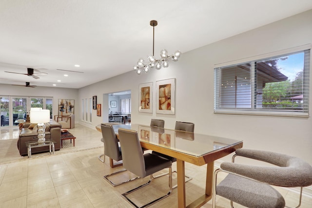 dining area featuring recessed lighting and ceiling fan with notable chandelier