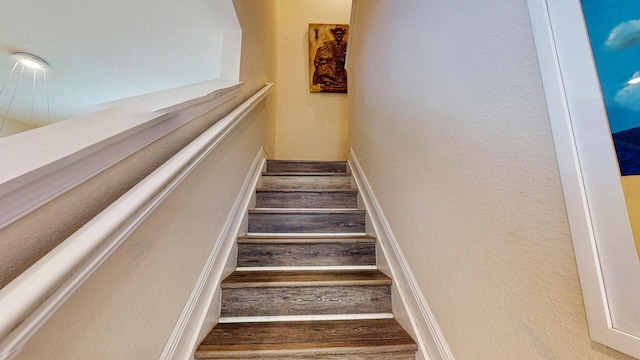 2323 NW Padova St, Port Saint Lucie, FL 34986 - stairs with wood finished floors