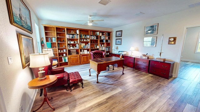 2323 NW Padova St, Port Saint Lucie, FL 34986 - office with a ceiling fan, wood finished floors, and visible vents