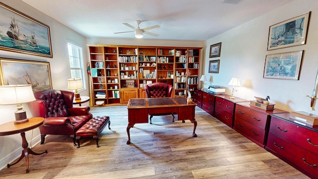 2323 NW Padova St, Port Saint Lucie, FL 34986 - office area featuring a ceiling fan, visible vents, and wood finished floors