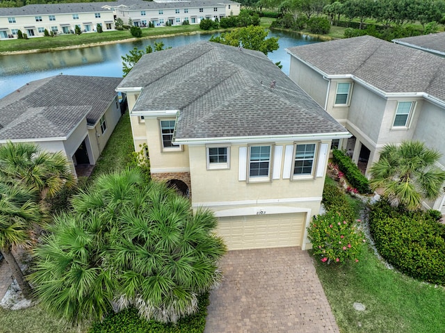 2323 NW Padova St, Port Saint Lucie, FL 34986 - birds eye view of property featuring a water view and a residential view