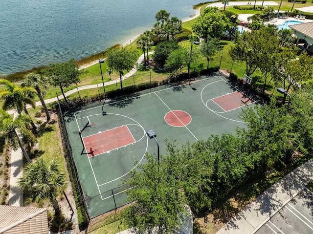 2323 NW Padova St, Port Saint Lucie, FL 34986 - view of basketball court with fence, community basketball court, and a water view