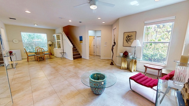 2323 NW Padova St, Port Saint Lucie, FL 34986 - living area featuring visible vents, stairs, baseboards, ceiling fan, and recessed lighting