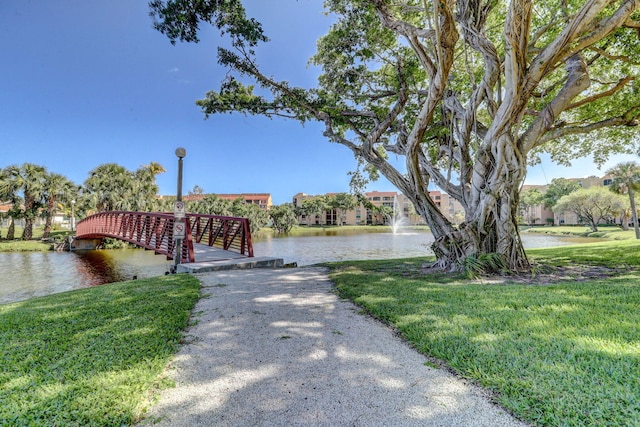 950 Egret Cir Unit 5409, Delray Beach, FL 33444 - exterior space featuring a water view and a yard