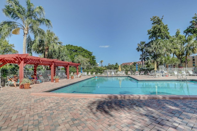 950 Egret Cir Unit 5409, Delray Beach, FL 33444 - pool with fence, a pergola, and a patio