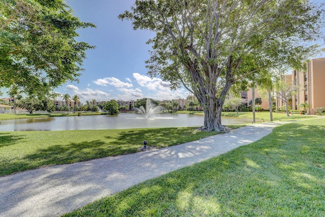 950 Egret Cir Unit 5409, Delray Beach, FL 33444 - view of property's community with a lawn and a water view