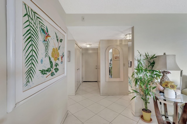 950 Egret Cir Unit 5409, Delray Beach, FL 33444 - corridor featuring light tile patterned flooring