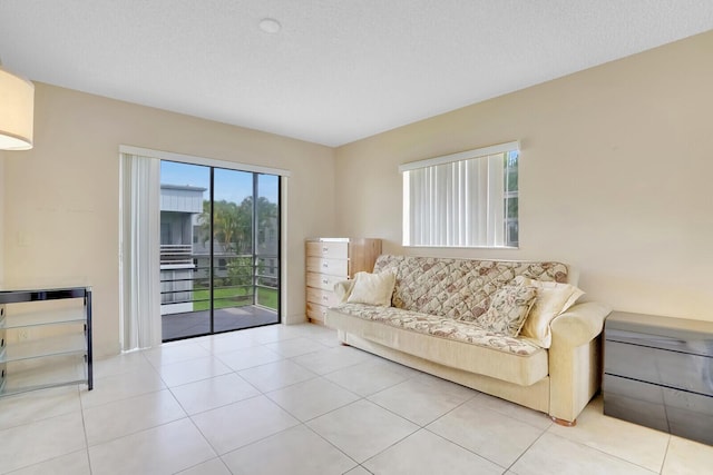 living area featuring tile patterned flooring