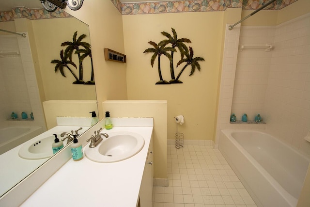 bathroom featuring vanity, tile patterned floors, and bathtub / shower combination