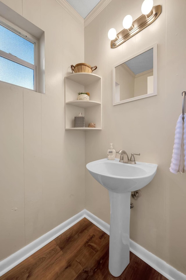 3205 Tennessee Ave, Fort Pierce, FL 34950 - bathroom with crown molding, baseboards, and wood finished floors