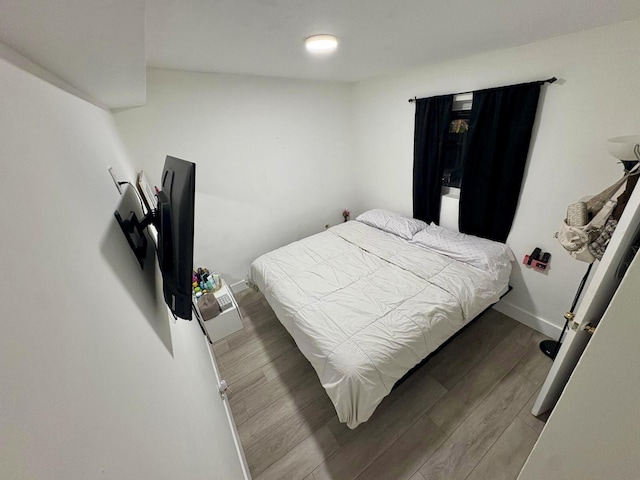10090 W Fern St, Miami, FL 33157 - bedroom featuring baseboards and wood finished floors
