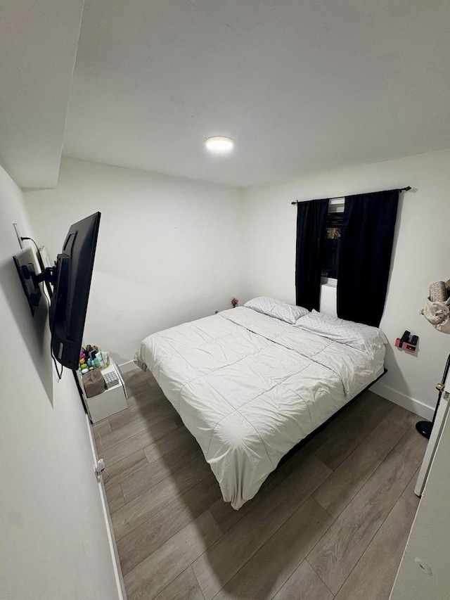10090 W Fern St, Miami, FL 33157 - bedroom with baseboards and wood finished floors