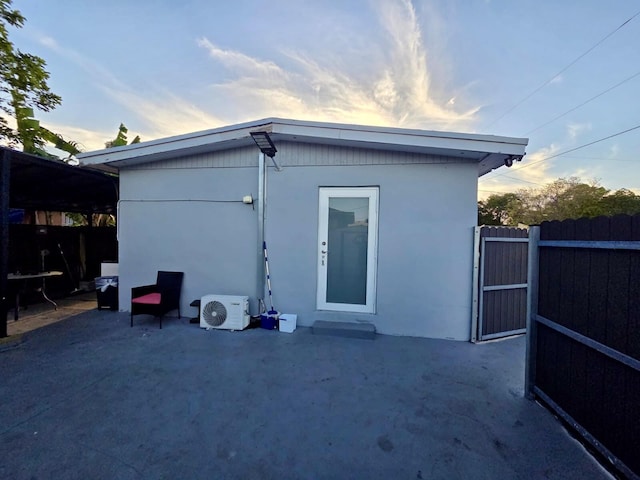10090 W Fern St, Miami, FL 33157 - back of house with fence, ac unit, and stucco siding