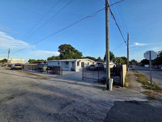 10090 W Fern St, Miami, FL 33157 - view of front of property with a gate and a fenced front yard