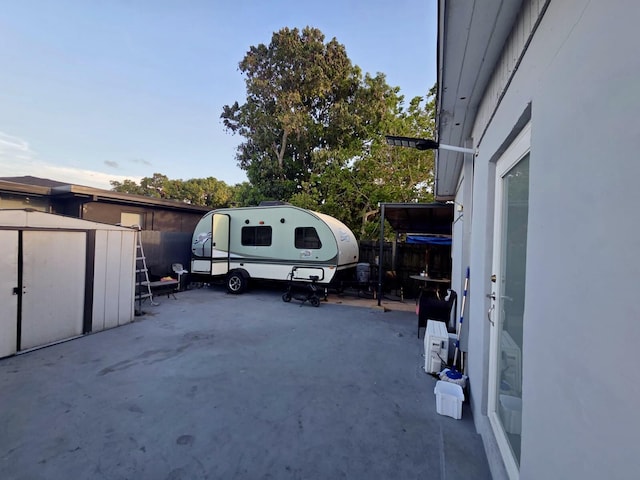 10090 W Fern St, Miami, FL 33157 - view of parking with fence and a shed