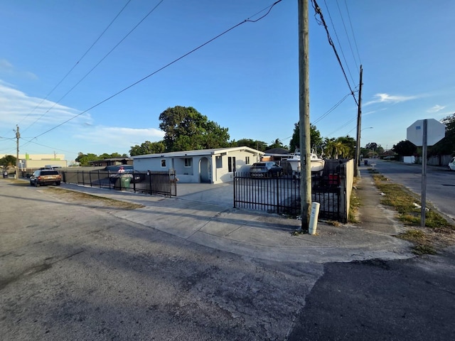 10090 W Fern St, Miami, FL 33157 - view of front of home featuring a gate and a fenced front yard