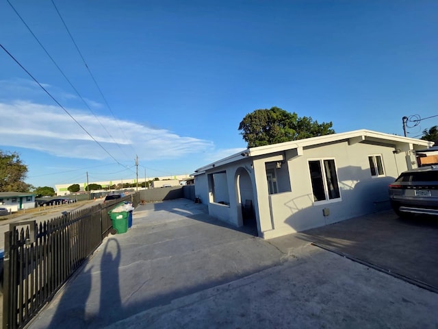 10090 W Fern St, Miami, FL 33157 - exterior space featuring a fenced backyard, a patio, and stucco siding