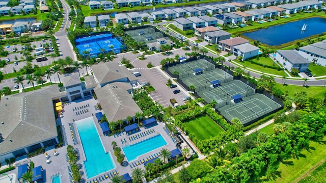 birds eye view of property with a residential view