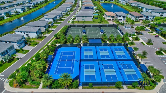 aerial view with a water view and a residential view