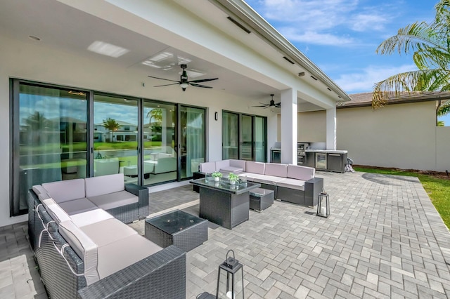 view of patio / terrace with ceiling fan and outdoor lounge area