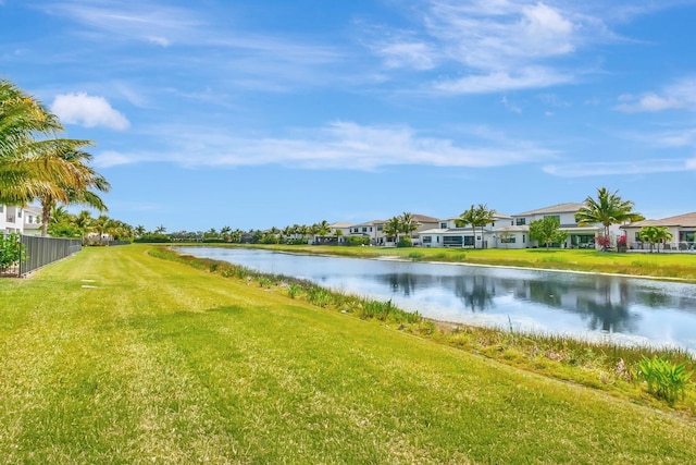 water view with fence and a residential view