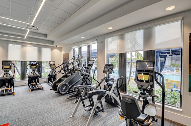 gym featuring carpet flooring, recessed lighting, and visible vents