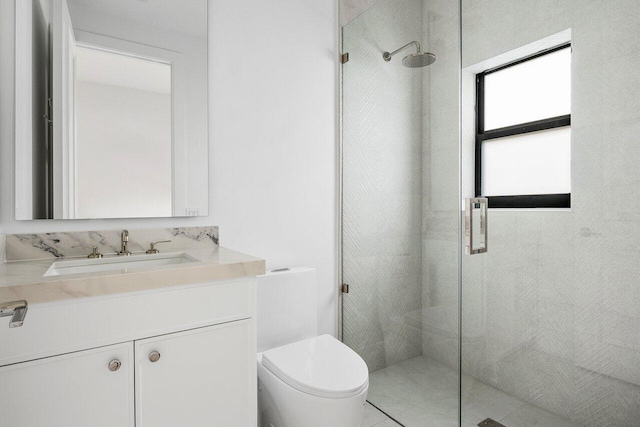 full bath with vanity, tile patterned flooring, a shower stall, and toilet