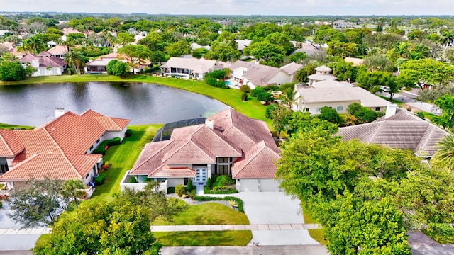 aerial view featuring a water view and a residential view