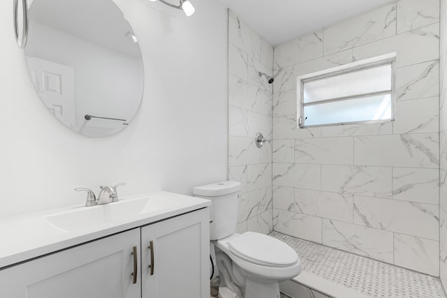 9603 NW 72nd Mnr, Tamarac, FL 33321 - bathroom with vanity, a tile shower, and toilet