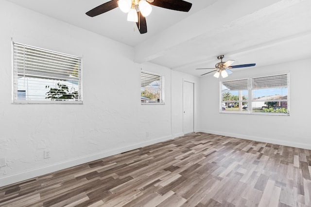 9603 NW 72nd Mnr, Tamarac, FL 33321 - unfurnished room featuring baseboards, a ceiling fan, and wood finished floors