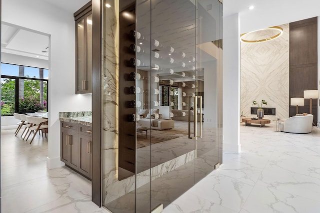 wine area with light marble finish flooring