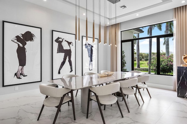 dining area featuring light marble finish flooring, plenty of natural light, and recessed lighting