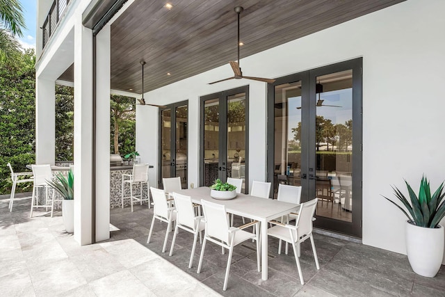 view of patio / terrace featuring french doors and outdoor dining area