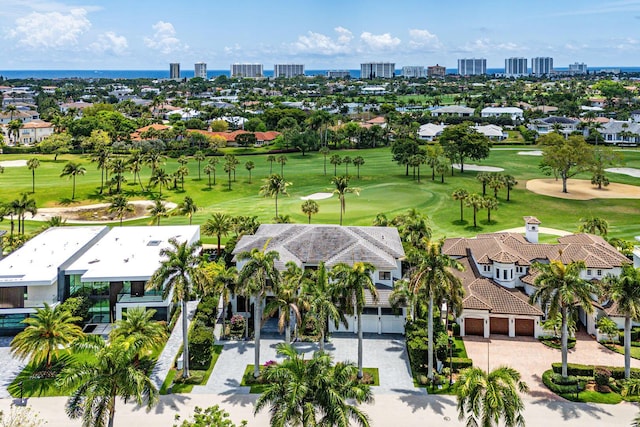 view of urban area with a golf course