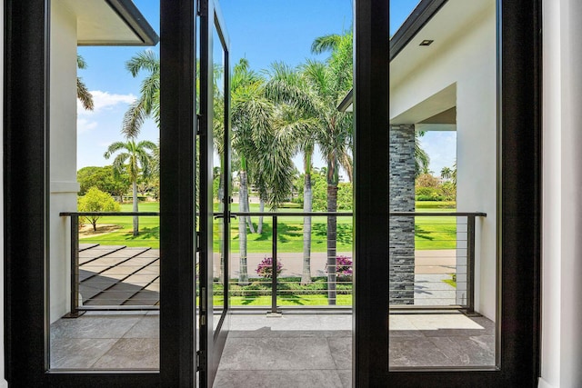 doorway to outside featuring plenty of natural light