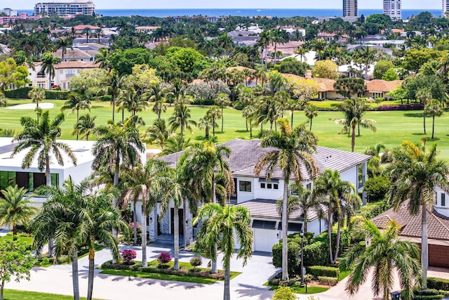 bird's eye view of a golf course and a large body of water