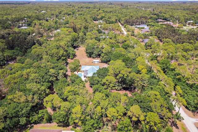 aerial view featuring a forest view