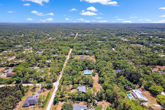 aerial view featuring a forest view