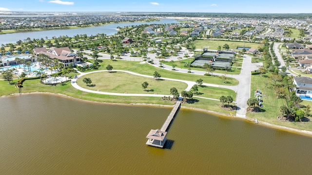 drone / aerial view with a residential view and a water view